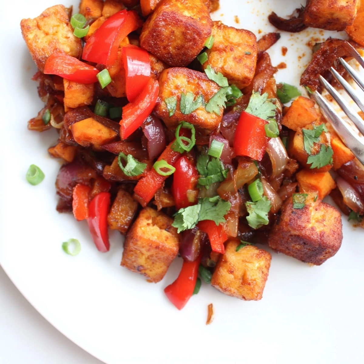 Homemade BBQ Tofu & Sweet Potato Hash recipe, ready to enjoy warm from the oven.