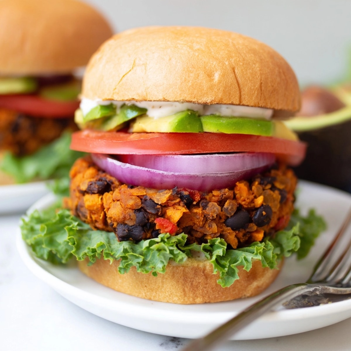 Hearty homemade Sweet Potato Black Bean Burger recipe, golden brown and ready to eat.