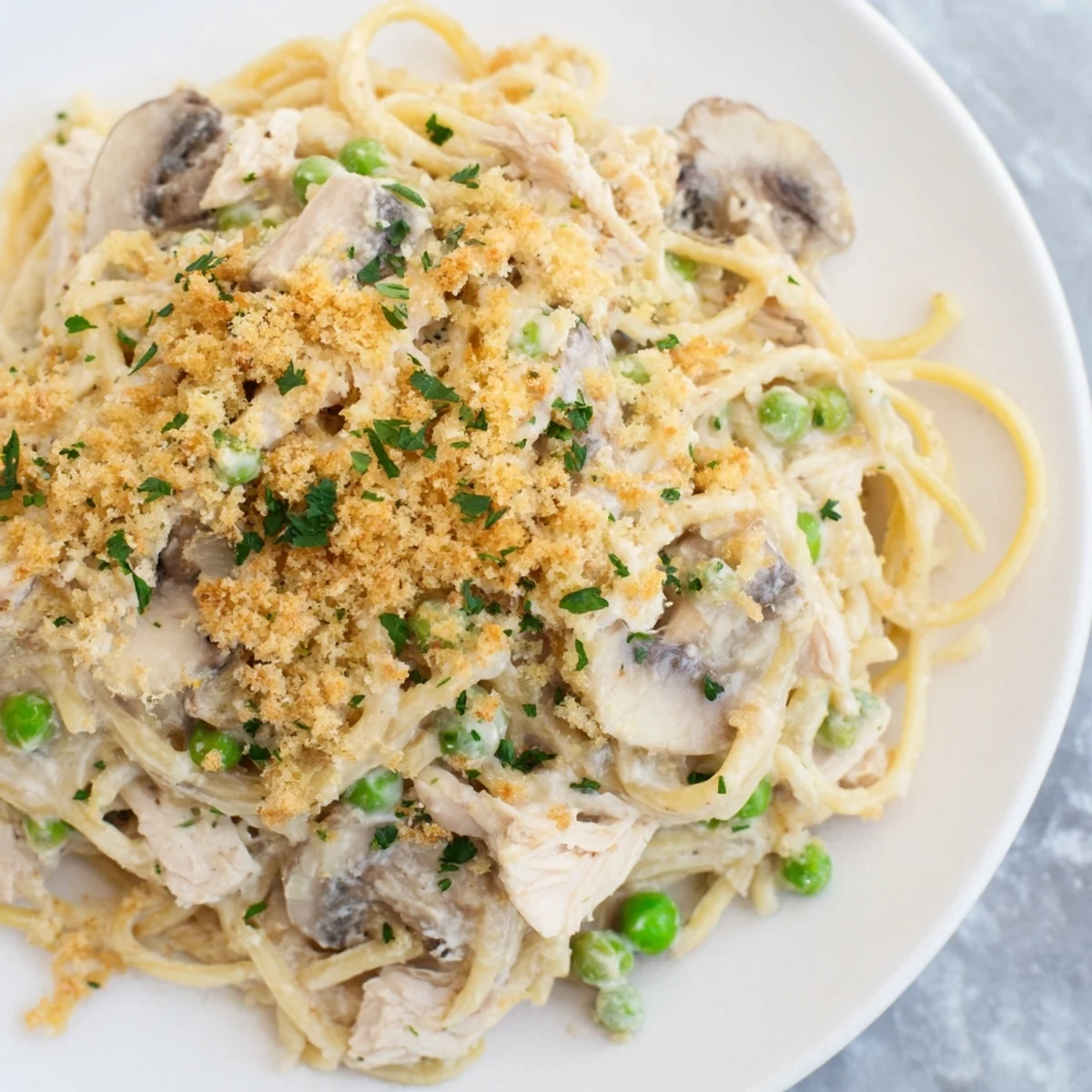 This comforting Turkey Tetrazzini features tender turkey and pasta, all smothered in a rich, cheesy sauce.