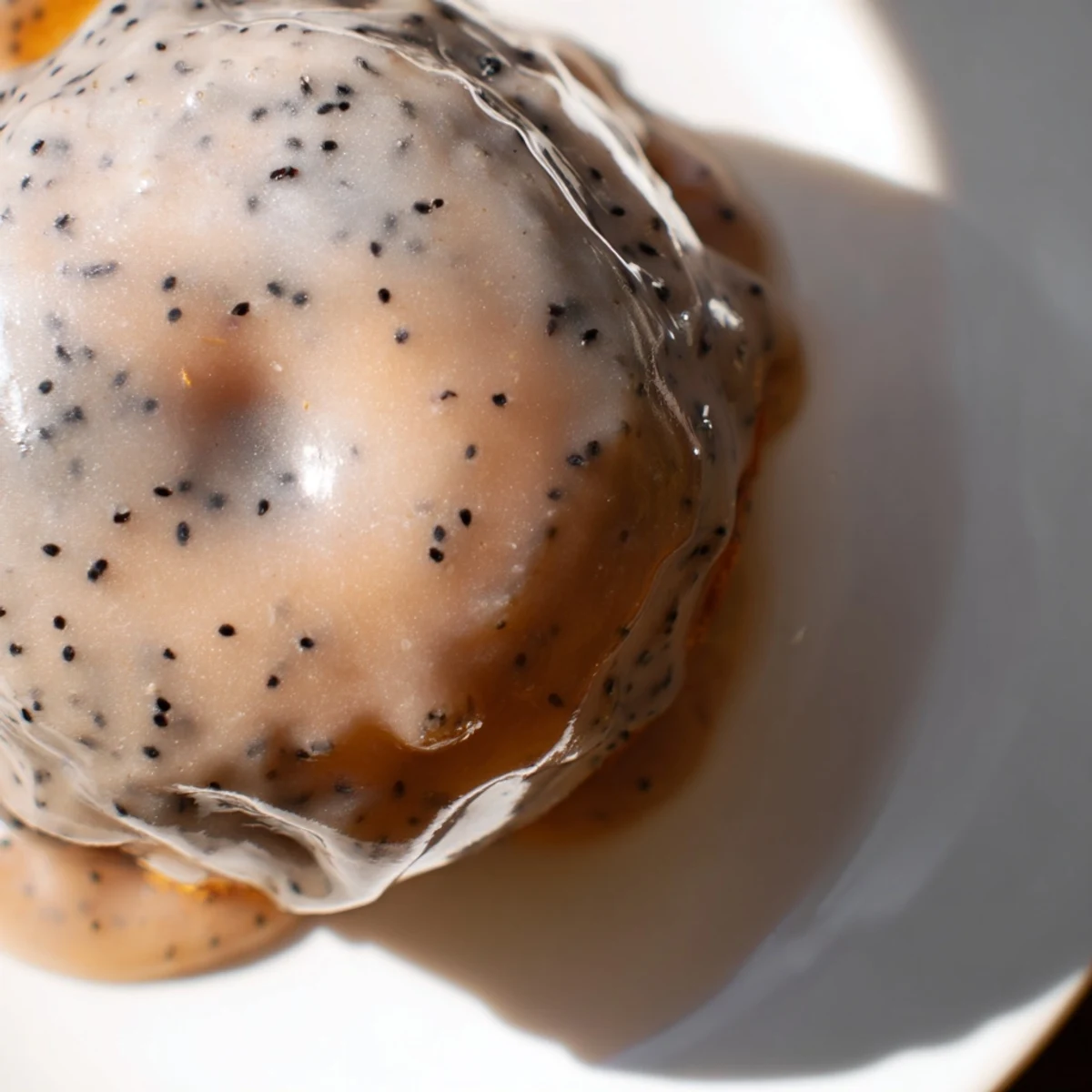 Golden glazed Earl Grey mochi donuts with a sweet white icing drizzle