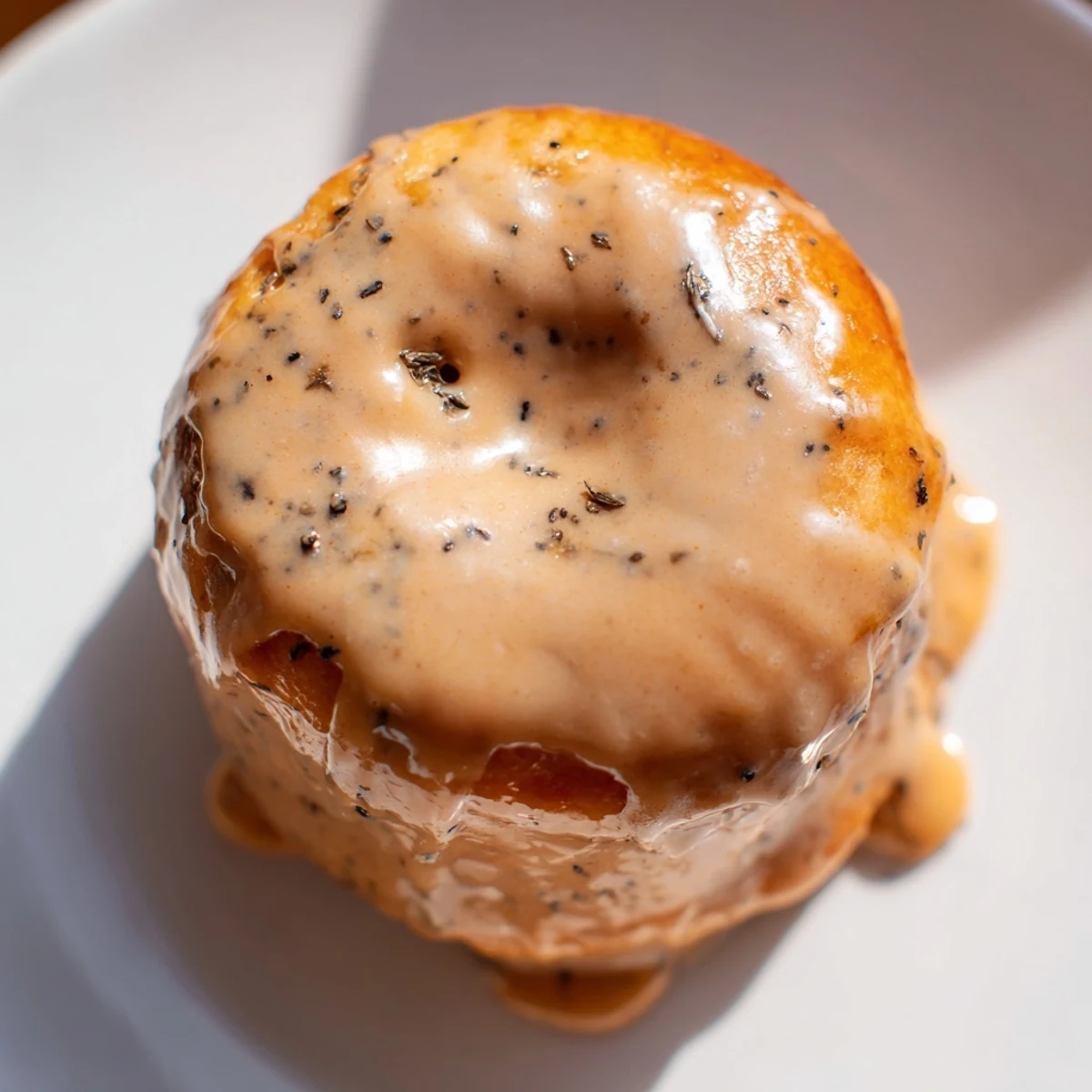 Chewy tea-infused Earl Grey mochi donuts arranged on a white serving plate