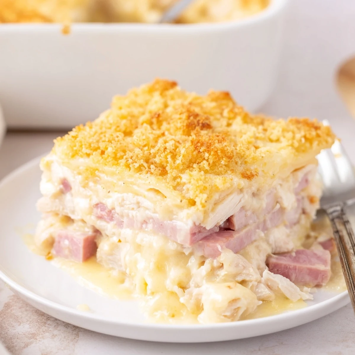 Golden-bubbly Chicken Cordon Bleu Casserole topped with crispy Parmesan Panko crumbs