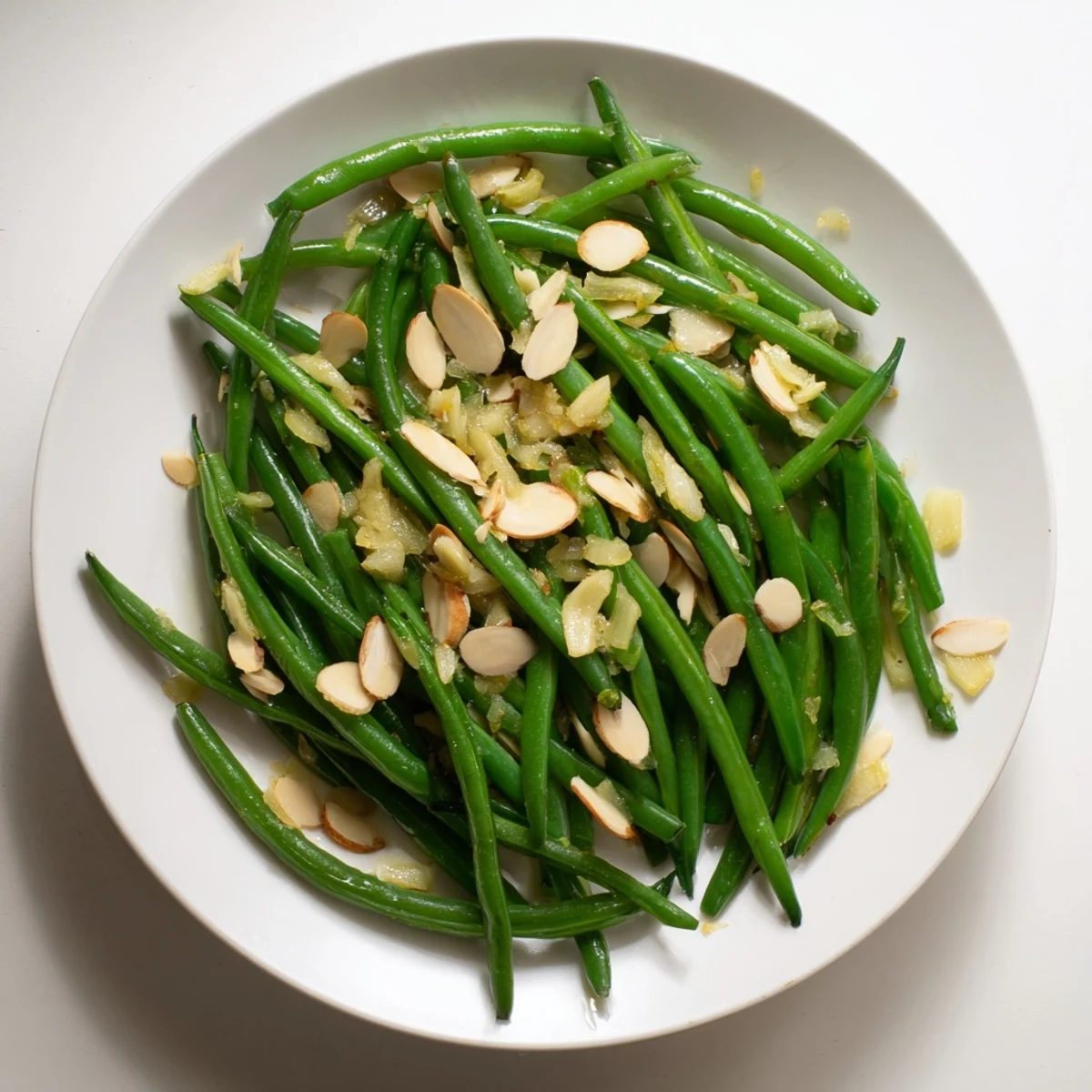 Fresh green beans sautéed with golden garlic and drizzled with olive oil